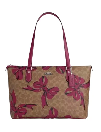 Coach Borough bags with a removable interior organizerCoach Gallery Tote Bag In Signature Canvas With Bow Print