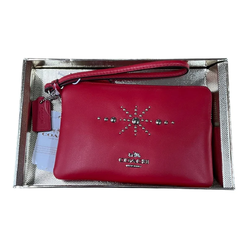 Ladies Coach Rogue bags with a star - shaped charm for a playful touchWristlet Designer By Coach, Size: Small