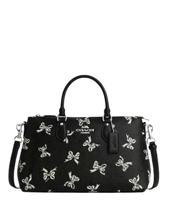 Ladies Coach Tabby bags with a detachable shoulder strapCoach Georgia Stachel Bag With Bow Print