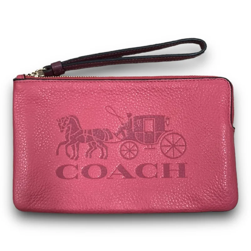 Coach bags with a chain - link trim and a leather body for a modern edgeWristlet Coach, Size Medium