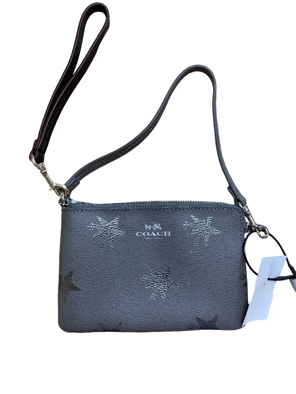 Ladies Coach Rogue bags with a star - shaped charm for a playful touchWristlet Designer Coach, Size Small