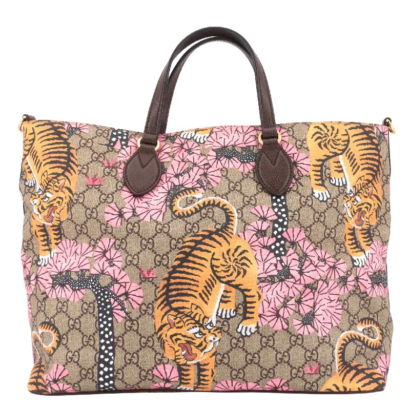 Ladies Gucci Dionysus bags in a pastel colorBegal Tiger GG Supreme Canvas Tote Bag