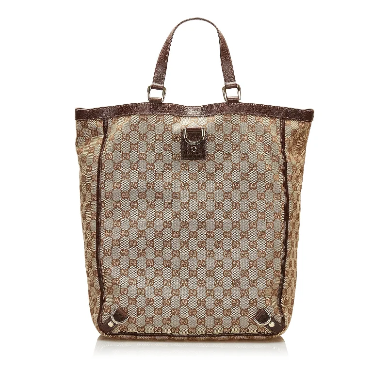 Women Gucci Sylvie bags with a monogram - embossed leatherGucci Abbey GG Canvas Tote Bag