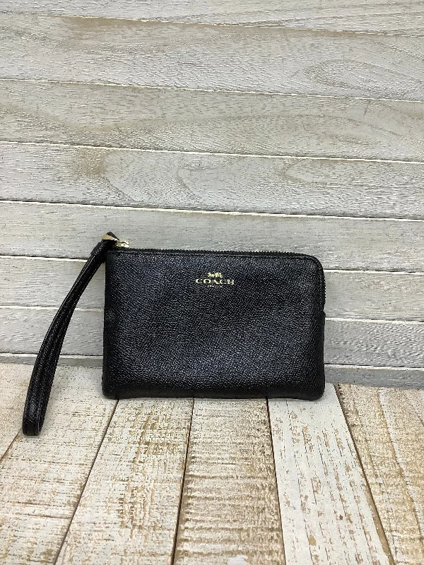 Ladies Coach Tabby bags with a textured leather surface for a more tactile lookWristlet Designer By Coach, Size: Small