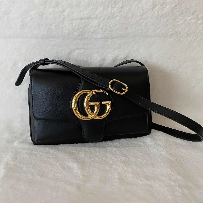 Gucci tote bags for women with a printed Gucci logoGucci GG Marmont Leather Aril Shoulder Bag