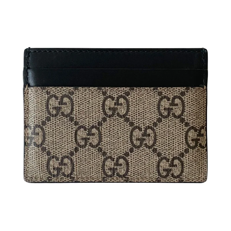 Women Gucci Sylvie bags featuring the signature web stripeGucci Kingsnake GG Supreme Card Holder