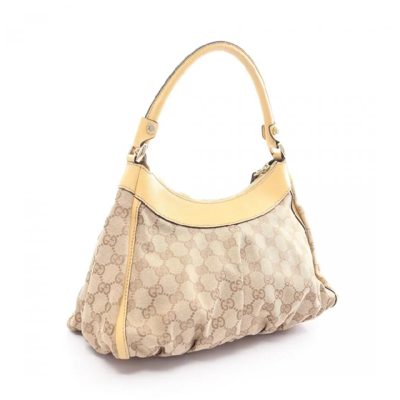 Women Gucci bags with a zippered interior pocketGucci Abby Beige Yellow Canvas Leather One Shoulder Bag