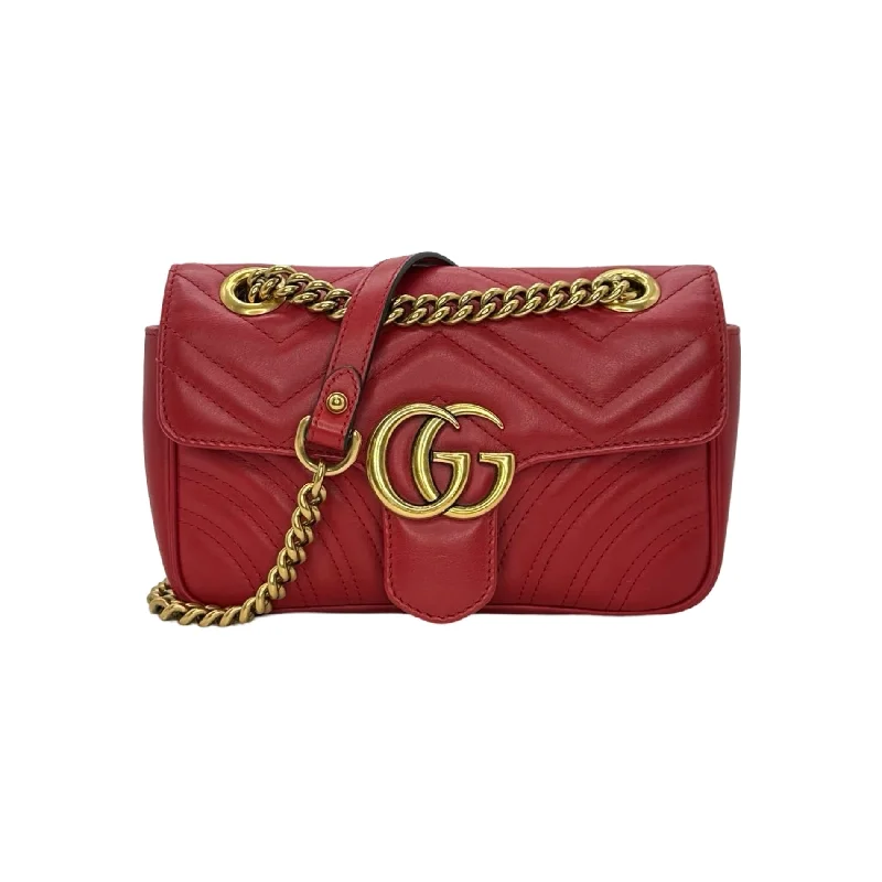 Women Gucci Sylvie bags with a crystal - embellished web stripeGUCCI: Quilted Leather GG Small Marmont