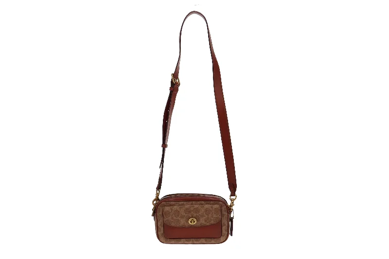 Small - sized Coach crossbody bags in smooth pebble leather for a compact carryCoach Willow Camera Bag In Signature Canvas