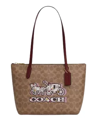 Ladies Coach Tabby bags with gold - toned hardware for a touch of luxuryCoach Fiona Zip Tote Bag In Signature Canvas With Horse And Carriage Print