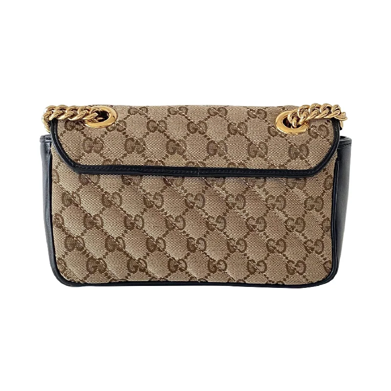 Women Gucci Sylvie bags with a leather - wrapped handleGucci Mini Marmont GG Canvas Bag