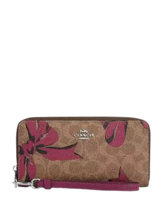 Coach crossbody bags with a woven leather strap for a unique textureCoach Long Zip Around Wallet In Signature Canvas With Bow Print