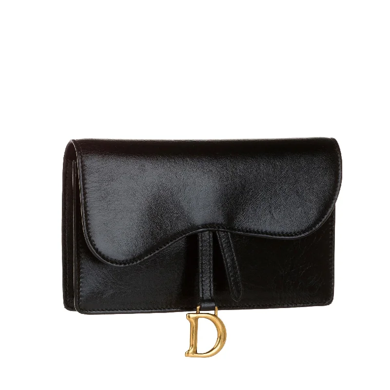 Christian Dior handbags with a snap - button closure and a decorative buckleDior Saddle Leather Belt Bag (SHG-31989)